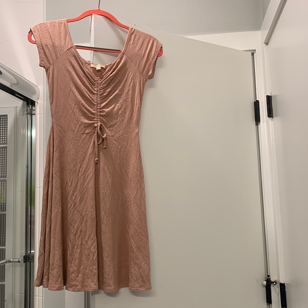Blush skater dress with cinched top.